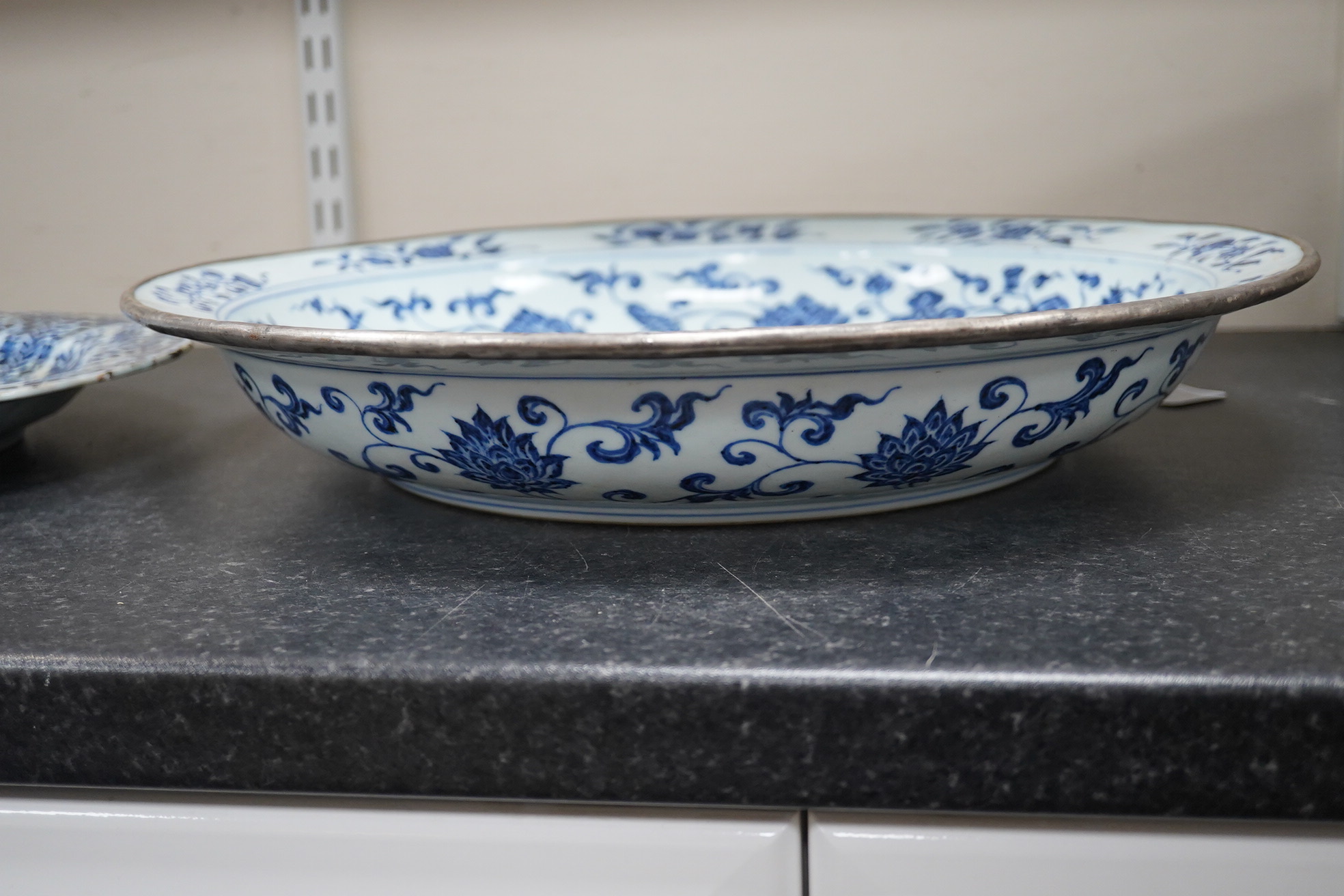 A large Chinese Ming style blue and white dish, possibly 18th century